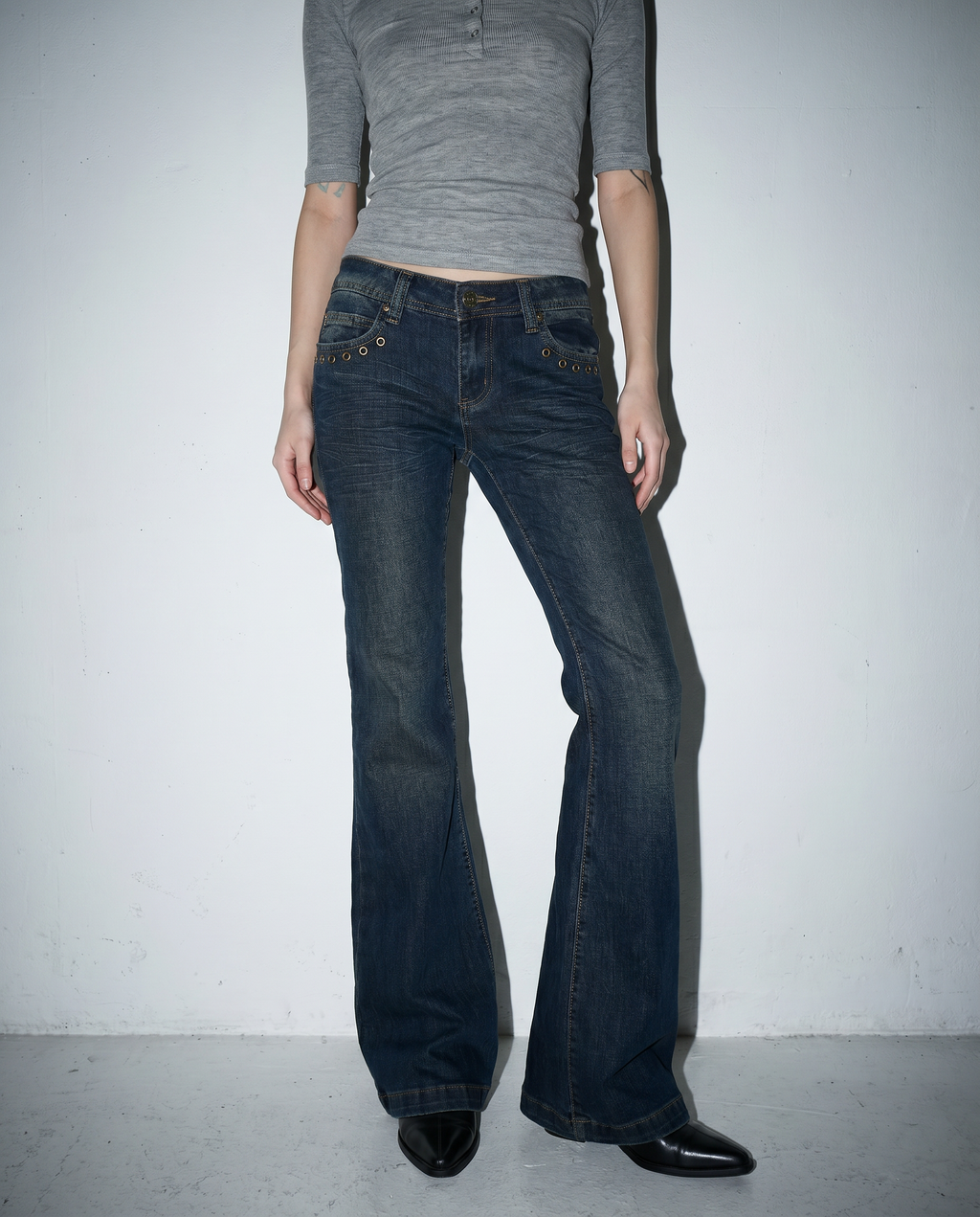Low Rise Flare Jeans with Eyelet Detail